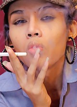 Smoking Mint Puffs And Plucks Her Huge Cock