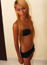Long Haired Blonde Ladyboy In Lingerie